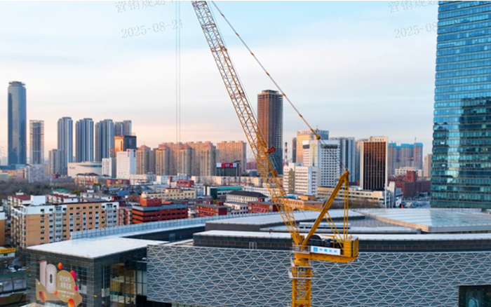 助建摩天双子塔 | 亚洲必赢动臂塔机闪灼“云端”